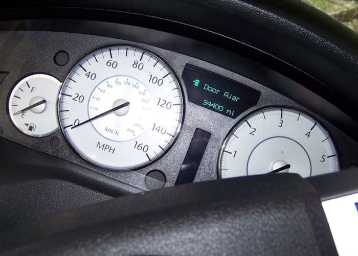 Always check the actual mileage of a used car. The readout may have been altered. Click to enlarge view.