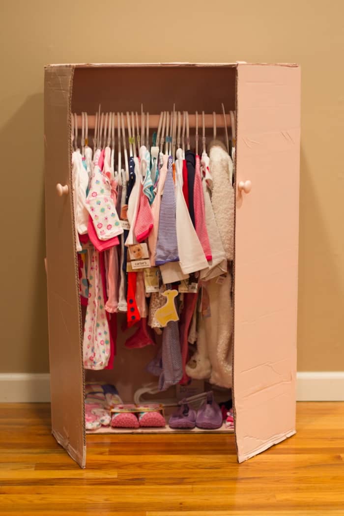 Here's a four-step guide to making a baby shower closet to display the gifts received.