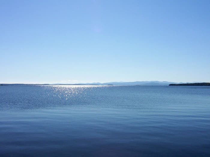 Beautiful Lake Champlain looks peaceful enough, but some say a monster swims beneath its placid waters.