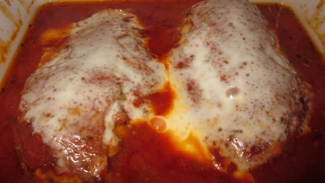 Hot, bubbly, and succulent chicken breast. This Italian-style recipe is delicious and easy to make.