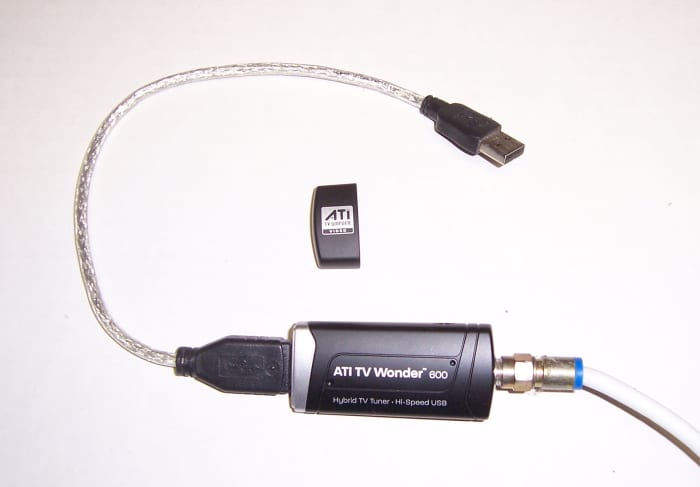 This is my personal USB TV tuner. It came with the extender cable to make it easy to hook up to a PC