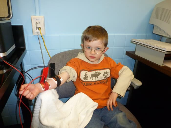 The author's son undergoes a sweat test to rule out cystic fibrosis.