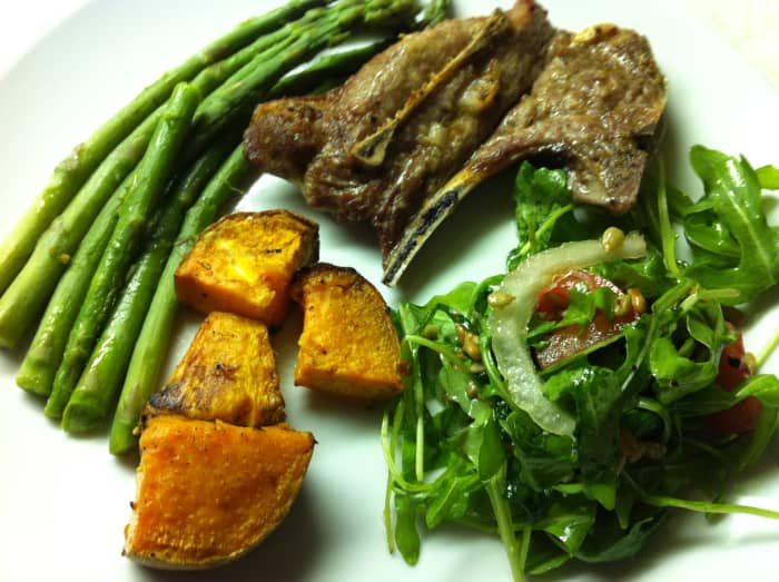 Broiled lamb shoulder chops with asparagus, roasted sweet potatoes, and an arugula salad