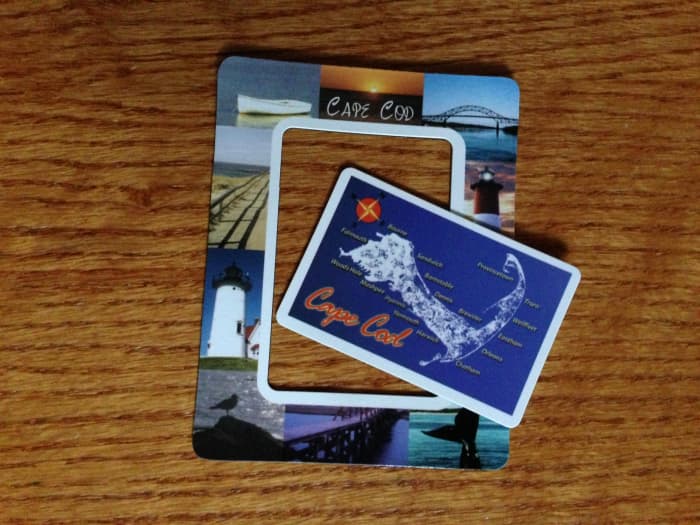 Magnets that offer something extra, such as this magnetic business card that pops out of a photo frame, are perceived as more useful... and are more likely to be kept.