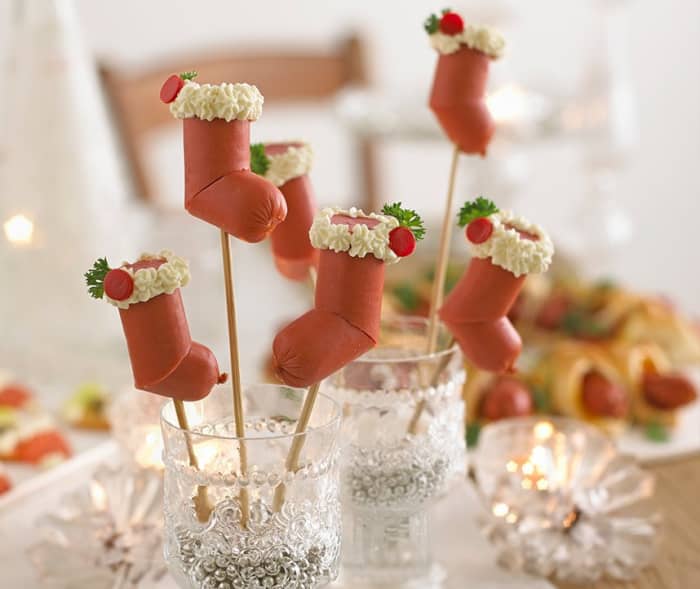 These dainty party appetizers shaped like Christmas stockings are sure to be a hit.
