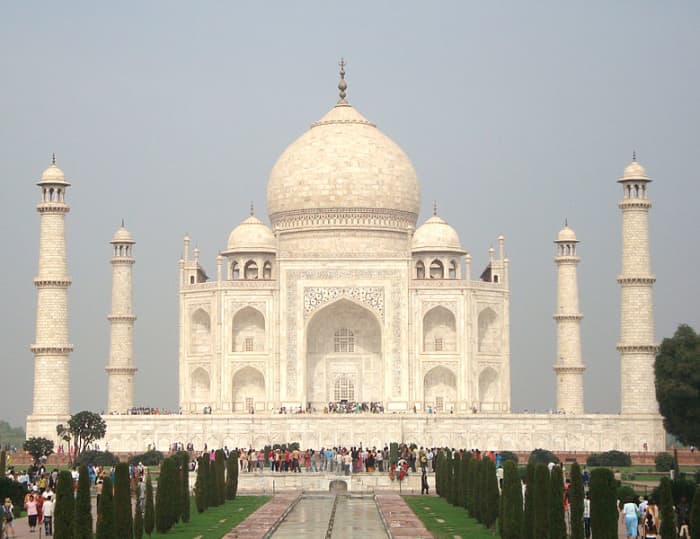 The Taj Mahal, on the bank of the Yamuna River in Agra, was built as a tomb by the Mughal emperor Shah Jahan for his beloved wife.