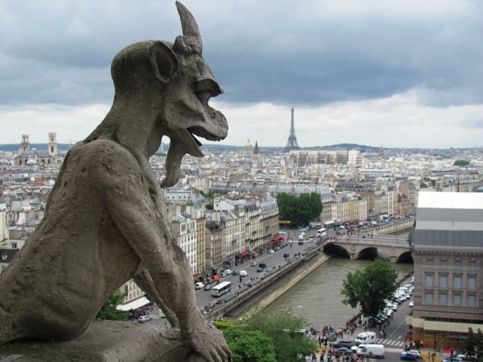 Poised on the Notre Dame Cathedral, a gargoyle looked out over the Paris sky prior to its burning in April 2019.