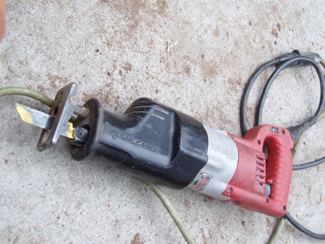 Saw all or reciprocating saw. This saw can cut through anything, I was told. It certainly worked well for the copper pipes we used.