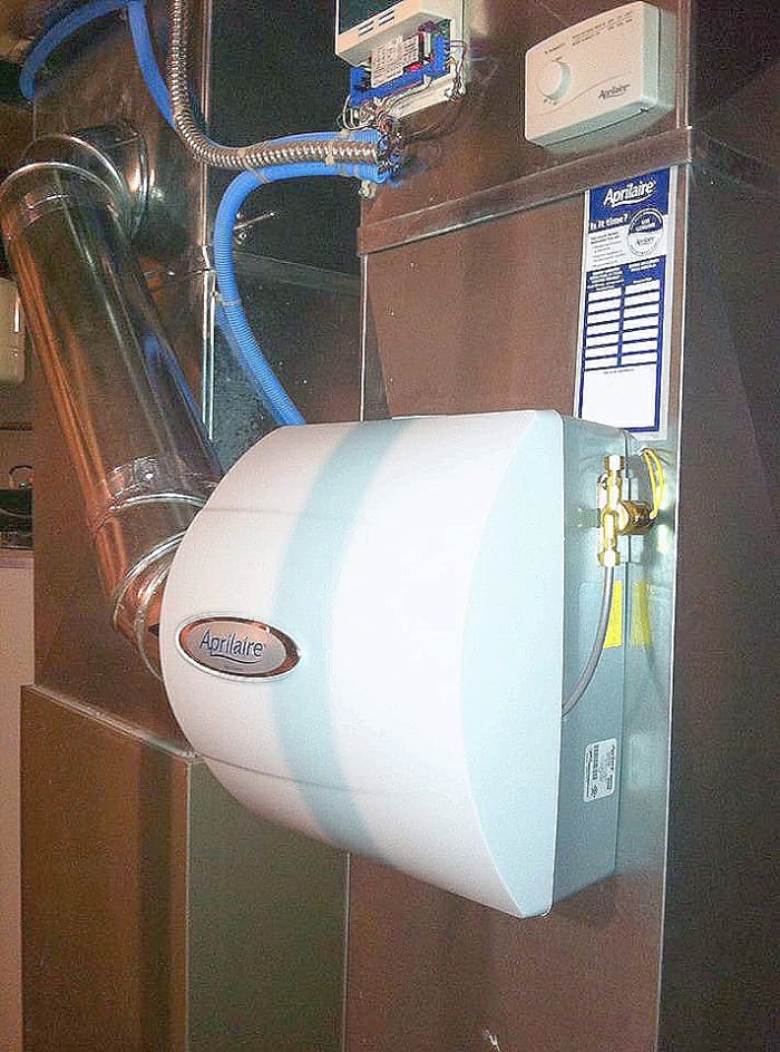 Run a test cycle and replace the cover. Your humidifier installation is done if the test cycle was good.