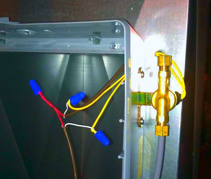 I poked a hole in the duct and inserted the wires from the humidifier to hide my connections. White is from the humidistat to humidifier unit and from unit back to the transformer. Red is just a continuation from the transformer to humidistat.