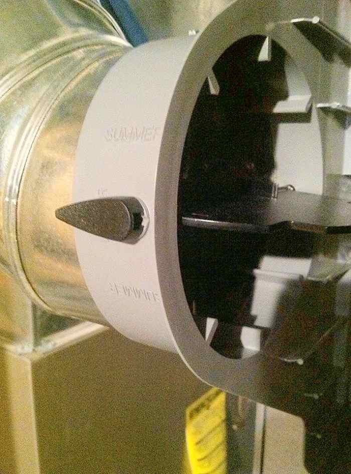 Install the 6" elbow to the casing. Be sure the bypass damper can swing.