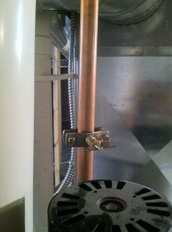 Install the saddle valve on the hot water line with the discharge pointing toward the humidifier. Be sure everything is securely tightened but not overtightened.