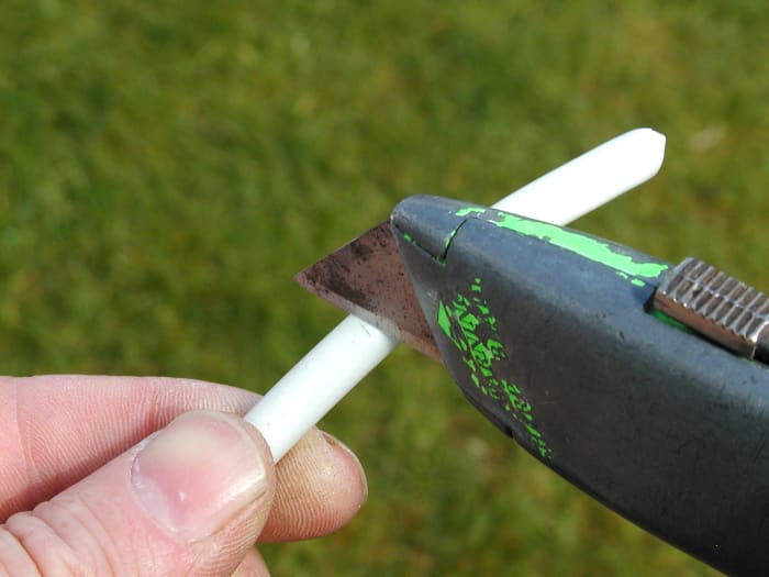.........alternatively, score the outer sheath with a knife, taking care not to cut all the way through