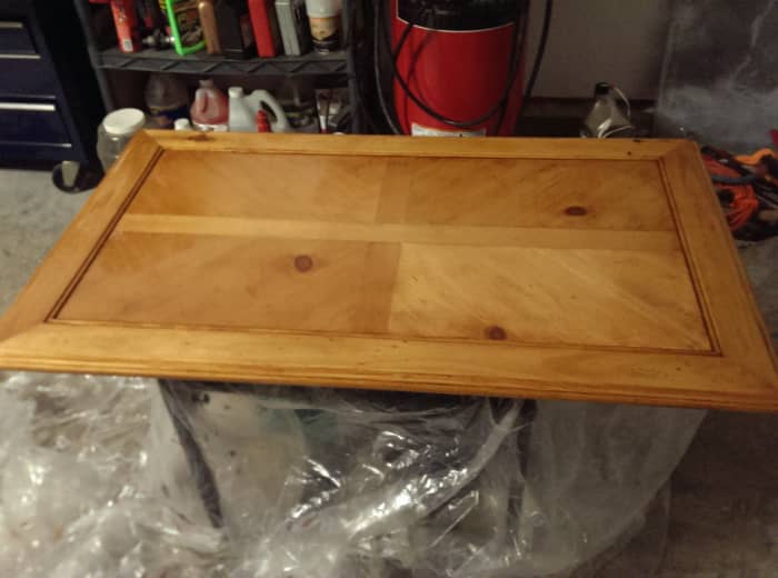 the second layer of stain! makes the table a little darker, but still not the color I want. After sanding, time to add a third coat!