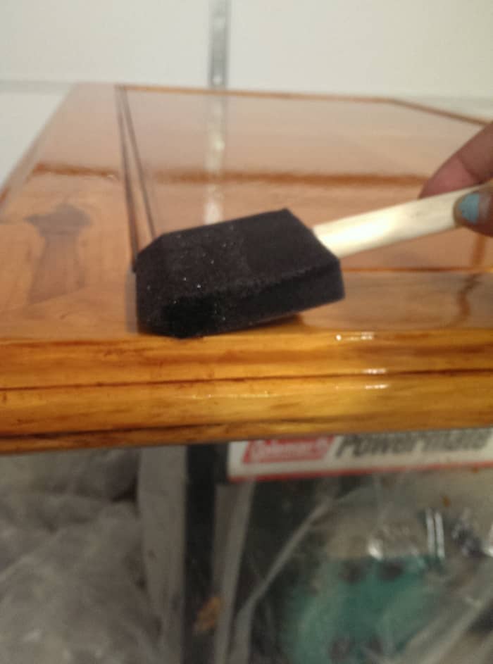 to prevent bubbles, use the flat side of the brush at a low angle and lightly but steadily drag the brush across the surface of the wood.