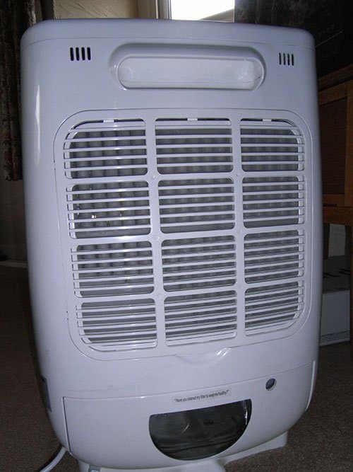 A desiccant dehumidifier not only removes moisture from the air, it also acts as a heater and helps to keep heating costs down.