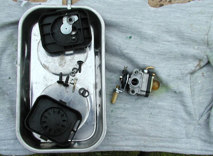 Magnetic parts tray. A cloth also stops parts rolling about.