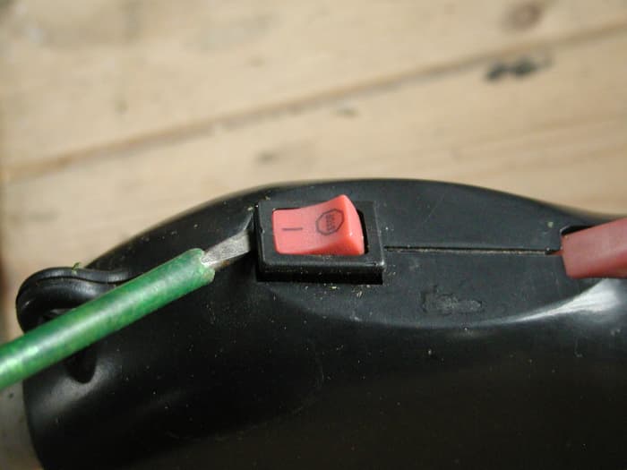 Remove the switch with a screwdriver