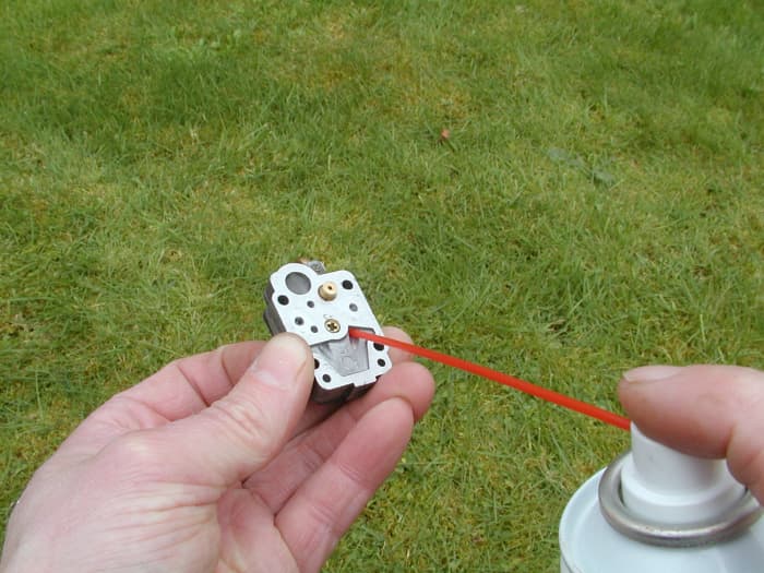 Clean the fuel pathways with carb cleaner. Make sure the outlets are pointed away from your eyes.