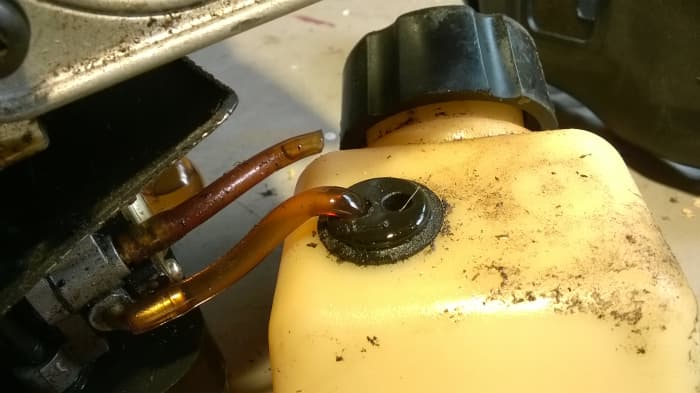 These fuel lines split where they passed through the tank seal.