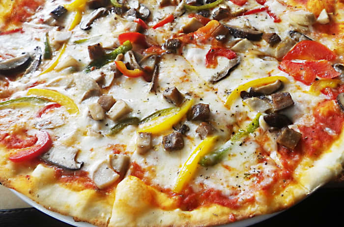 Pizza is the first complete meal that can be printed by a 3D printer, although at the moment the topping is simpler than the one shown in this photo.