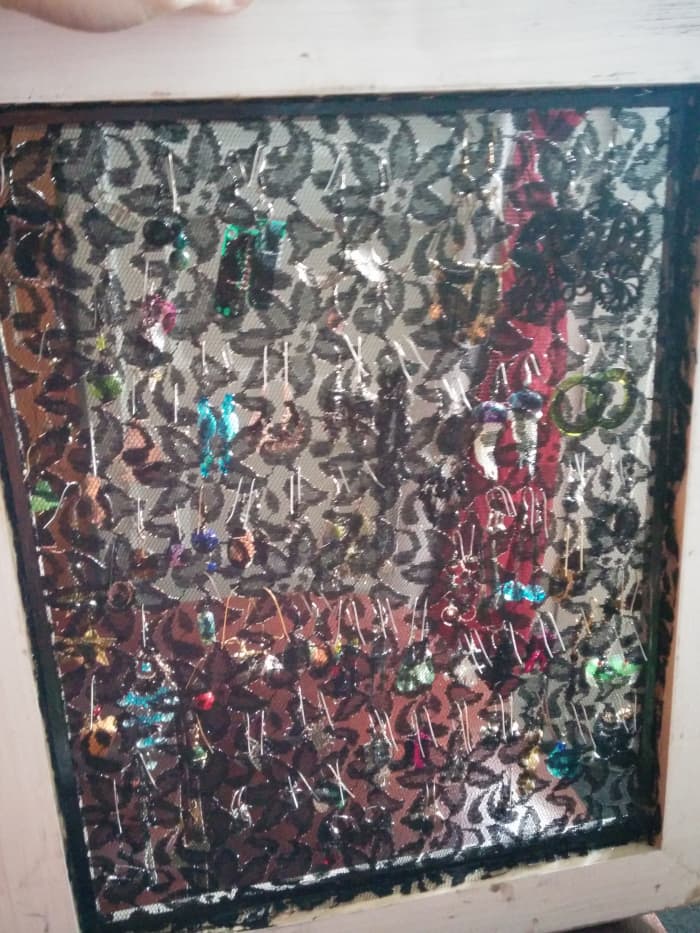 My earring organizer from the back. You can see where I've used the strips to glue the lace in place.