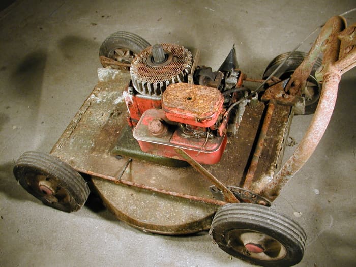 This mower has been stored in a leaking shed and rusted up for over 20 years without being started. I'm going to check out the points and carburetor to see if it's ok. This machine has a pump-and-weir type carburetor.