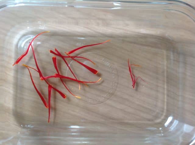 Drying your spice is super easy. Saffron threads take a few days to dry and go from tiny ribbons (left) to little red threads (right).