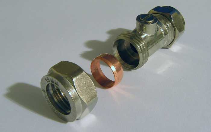 An inline isolating valve which is often used for disconnecting water to individual appliances. A copper compression ring or "olive" seals and makes the fitting water tight. The valve is turned on/off with a screwdriver.