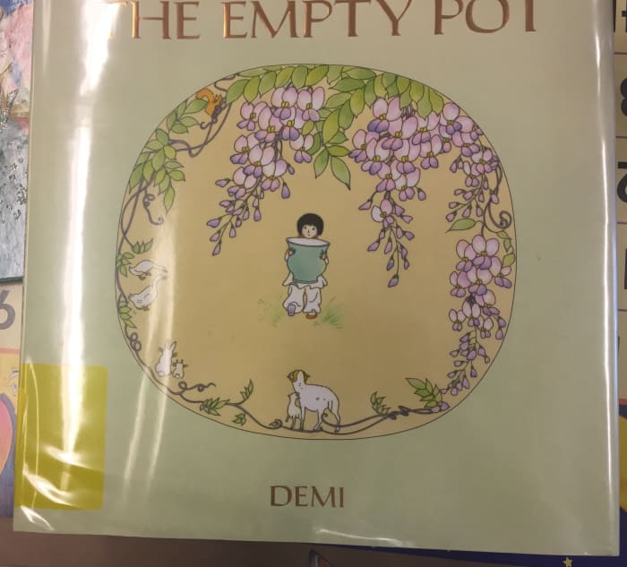 Old wisteria vines are common in China and Japan. On the cover of this book about a Chinese boy who is gifted with a talent for gardening, wisteria is showcased.