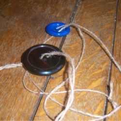 A finished button on a string.