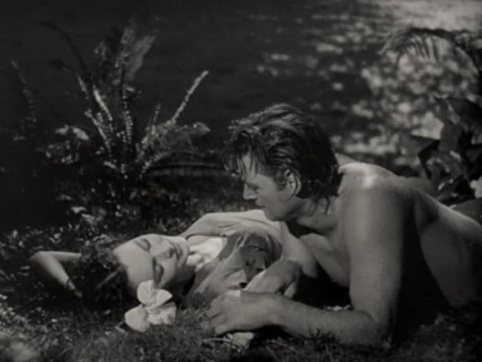 Jane (Maureen O'Sullivan) and Tarzan (Johnny Weissmuller) in a scene from the 1941 film Tarzan's Secret Treasure.