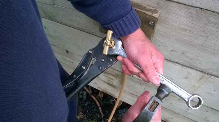 Tap gently if the head still remains difficult to remove