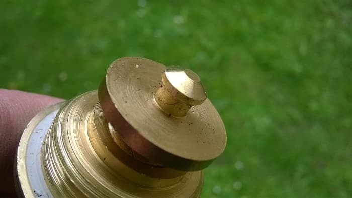 This flanged piece is called a "jumper" and has a mushroom shaped lug (or nut) at the center to retain the washer