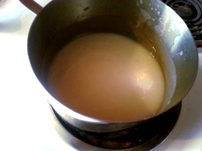 This soap has traced. It is about the consistency of cake batter--a little thick but still easily pourable.