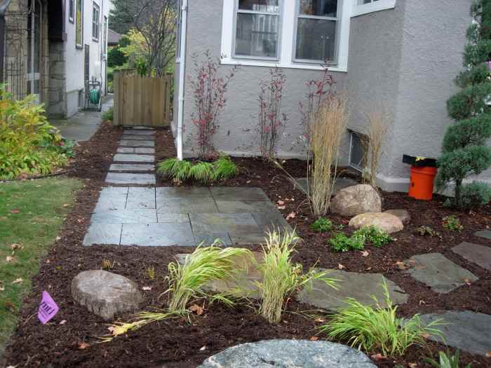 Square patio tiles as a path and seat area
