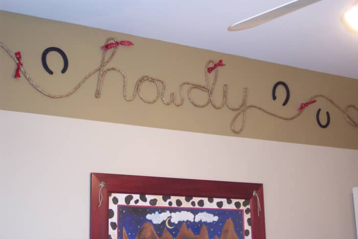 Rope, red bandanas, horse shoes, and paint came together nicely for a cowboy theme in my son's bedroom.