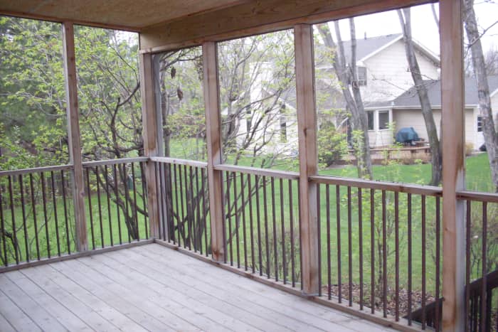My deck, before cleaning with dish soap. You can almost smell the cedar in the air just looking at the photo.