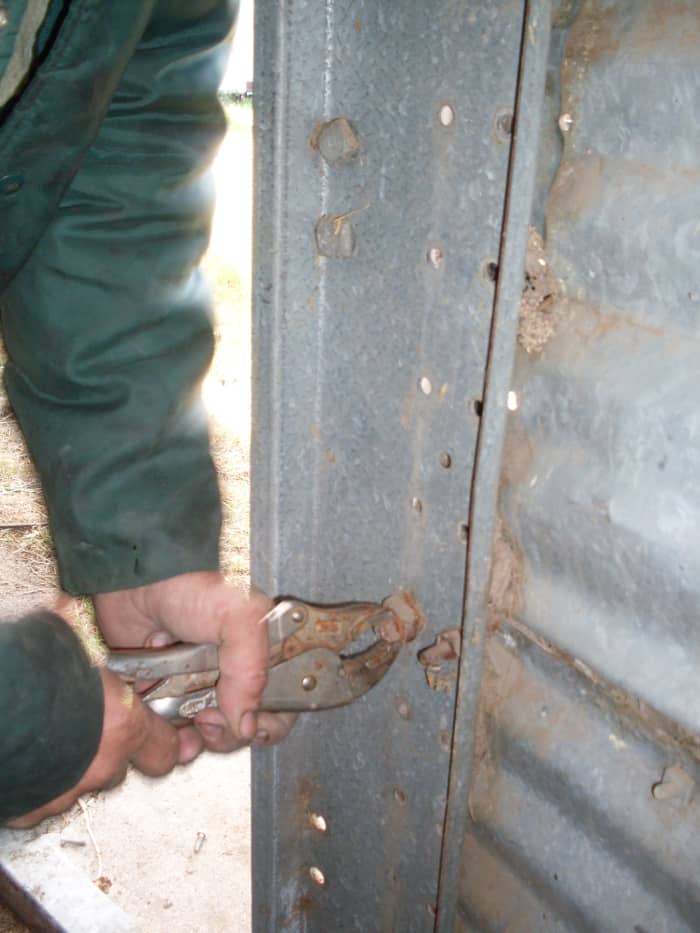 If you have someone on the inside, attempting to hold the vice grips, be careful! Hand and wrist injuries are very probable, should the vice grips slip, or get twisted out of the user's hands.
