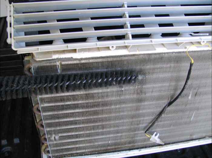 You can use a dryer vent brush to get the dust off of aluminum AC fans. 