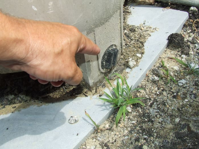 Make sure all plugs are installed in the filter assembly before starting the pool pump. This plug is at the bottom of the filter, this is where you would drain the filter.