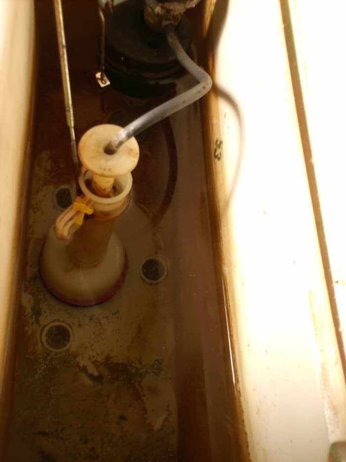 Slide the tower back on, screw on the cap, slide the refill tube back in place, turn on the water again, and you're done!