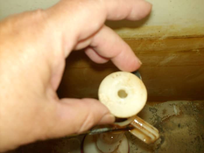 How to Fix Your Toilet's Flush Valve Seal (With Photos) Dengarden