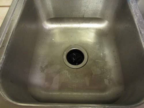 What you can't see is the hair, tea leaves, coffee grounds, and celery bits I stuffed down there all day to clog it. This is good! I drained off as much extra water as possible.