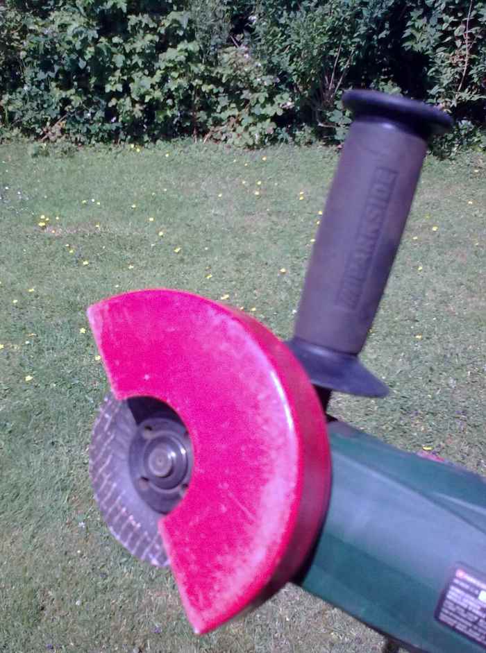 Guard enclosing both sides of disk.