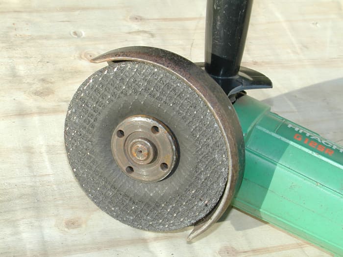 Close up of disk and protective guard. This should be in place at all times and adjusted properly