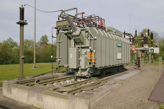 Transformer in an electrical sub-station. The function of a transformer is to either increase or decrease voltage.