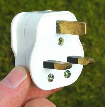 The insulating black plastic shrouds on the pins of this plug prevent contact with the pins during insertion/removal.