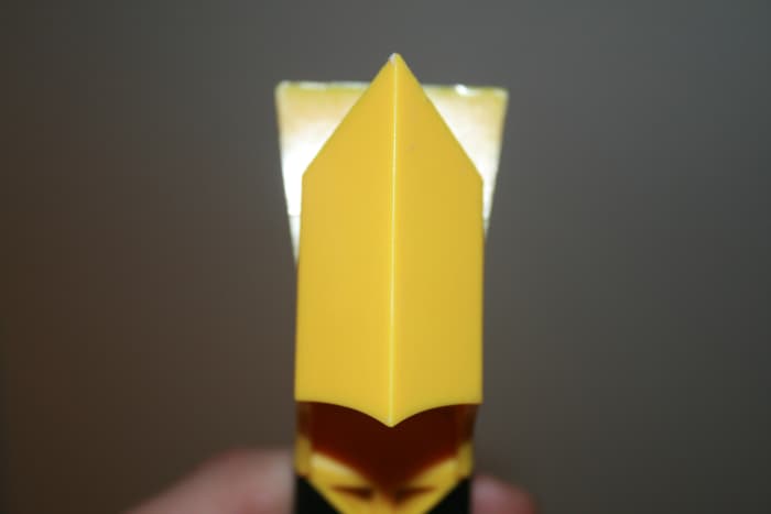 This edged portion lays in the seam of the the two joints. In this instance it is where the tub meets the floor.