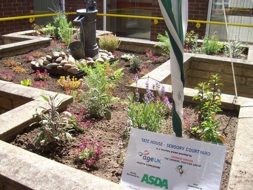 Asda helps Age Concern grow a sensory garden for the blind and partially sighted in Harrogate, UK.